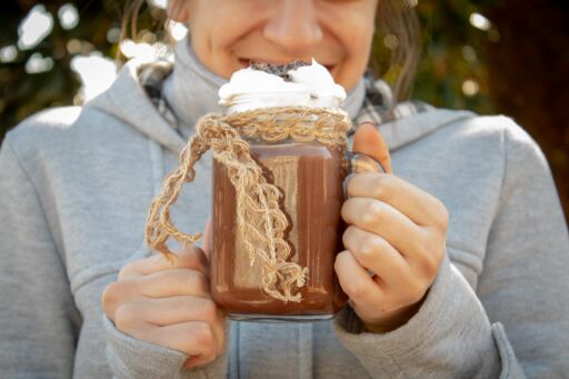girl holding hot chocolate