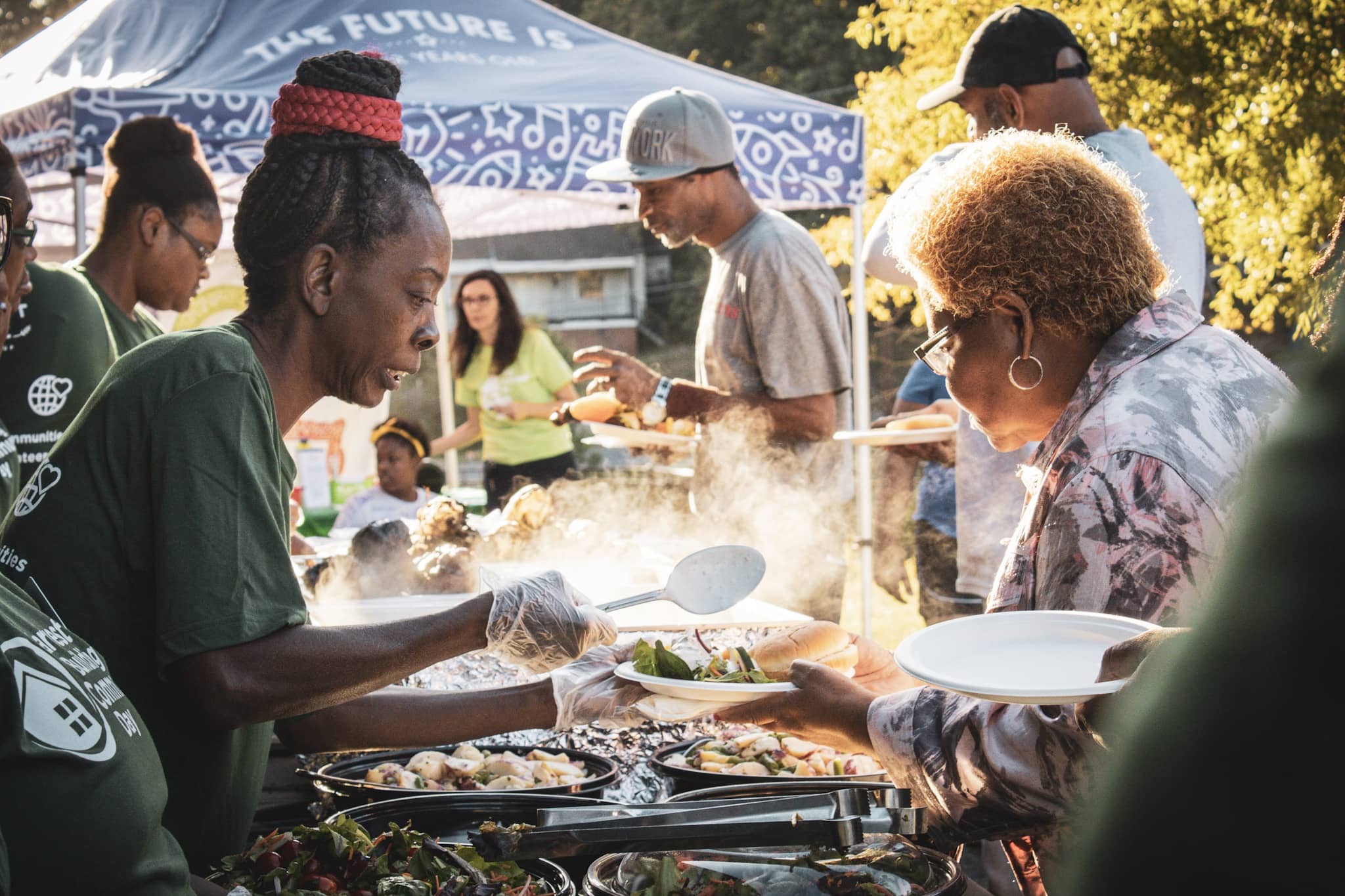 harvest table event serving people